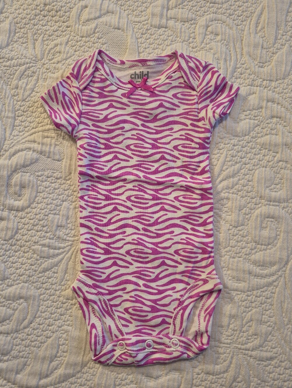 Child of Mine by Carter's NB bright purple and white animal print bodysuit NWOT